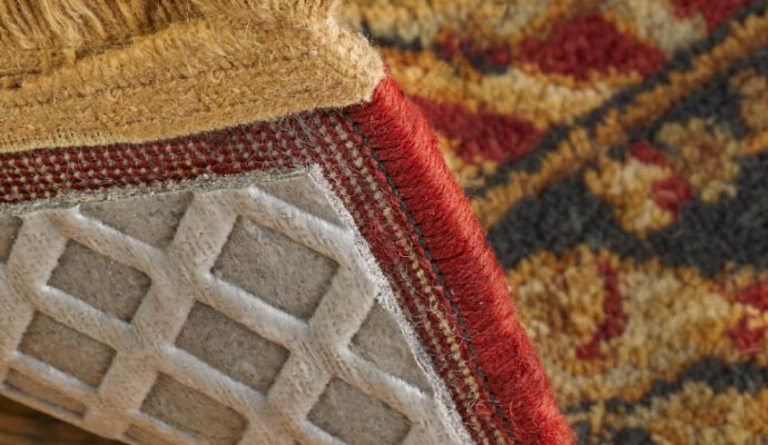 Clean area rug with absorbent pad