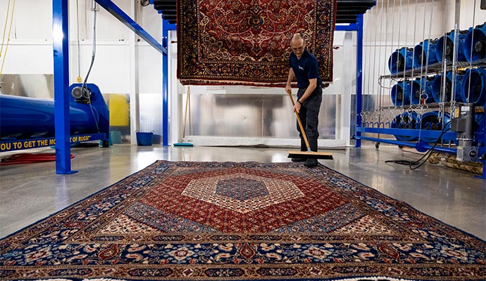 Rug specialists cleaning rug