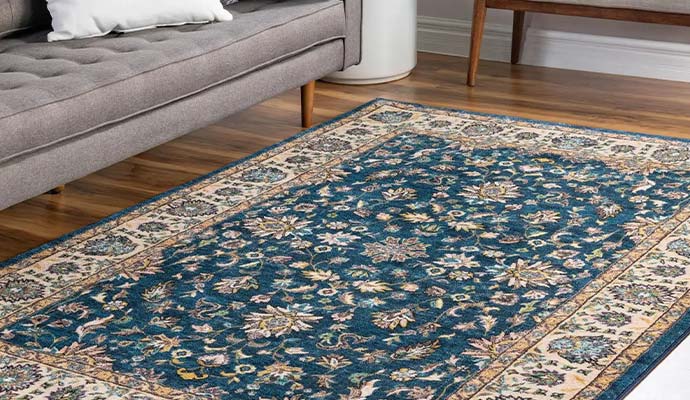 Clean floral area rug after protective treatment in a living room