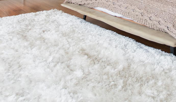 Why is cleaning flokati rugs important?