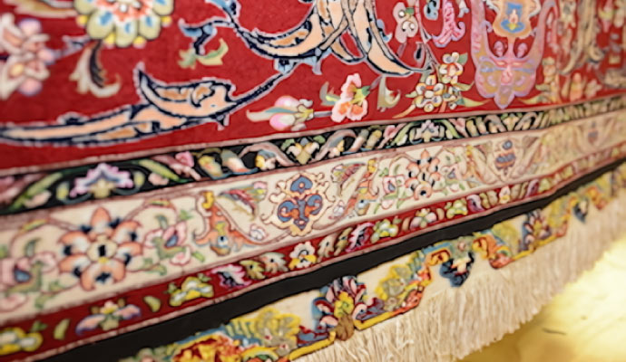 Close-up view of a red patterned oriental rug