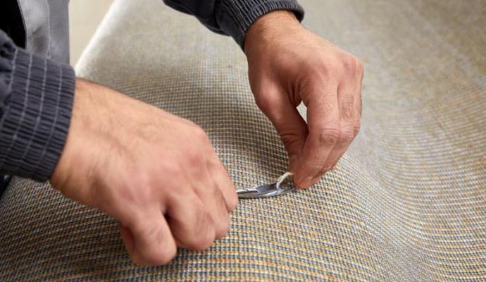 Rug backing repair in progress