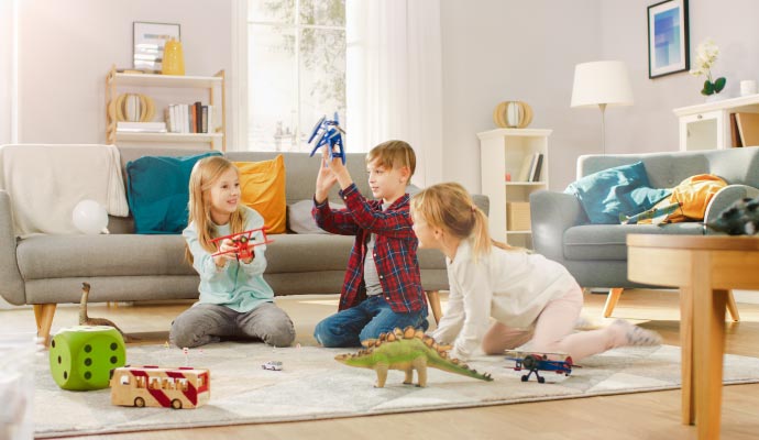 Children playing on rug