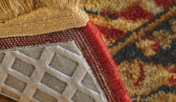 Protective rug pad under iranian rug