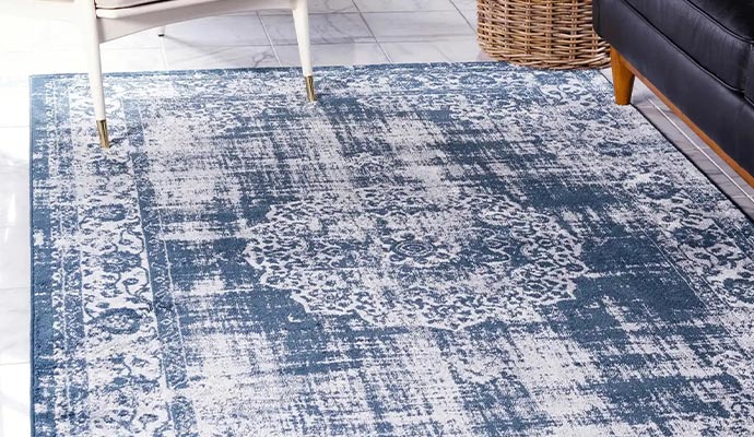 Synthetic rug placed on tile floor